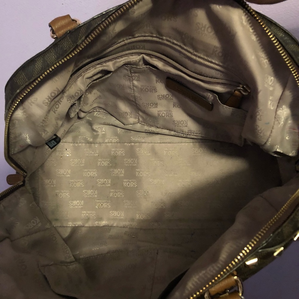 Michael Kors Brown Hand Bag. Missing some studs